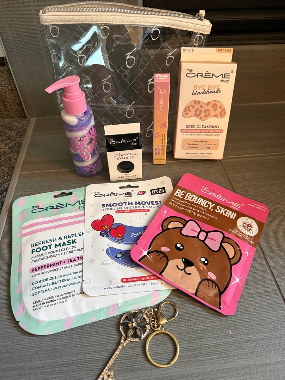 Bundle ckear Cosmetic Pouch with Assorted Face Masks & Keychain and the creme sh